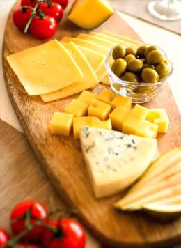 How should cheese be stored